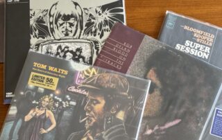 Original vinyl pressing, box set vinyl release, and Vinyl Me Please VMP exclusive record editions displayed side by side