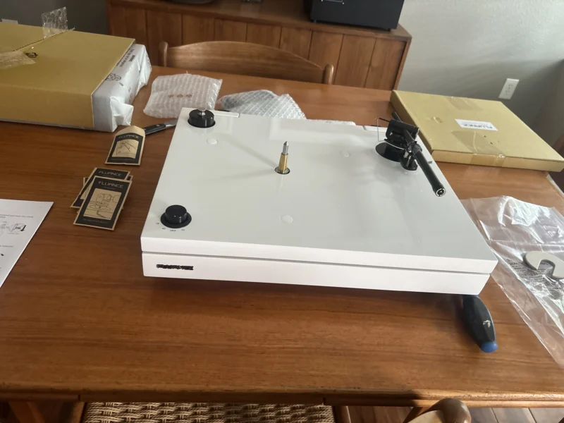Fluance RT87 dual-plinth system unboxed showing isolation platform and turntable base