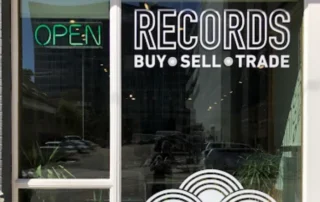Recollect Records storefront in Denver Colorado featuring curated used vinyl records and music collectibles.