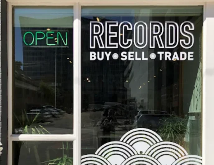 Recollect Records storefront in Denver Colorado featuring curated used vinyl records and music collectibles.