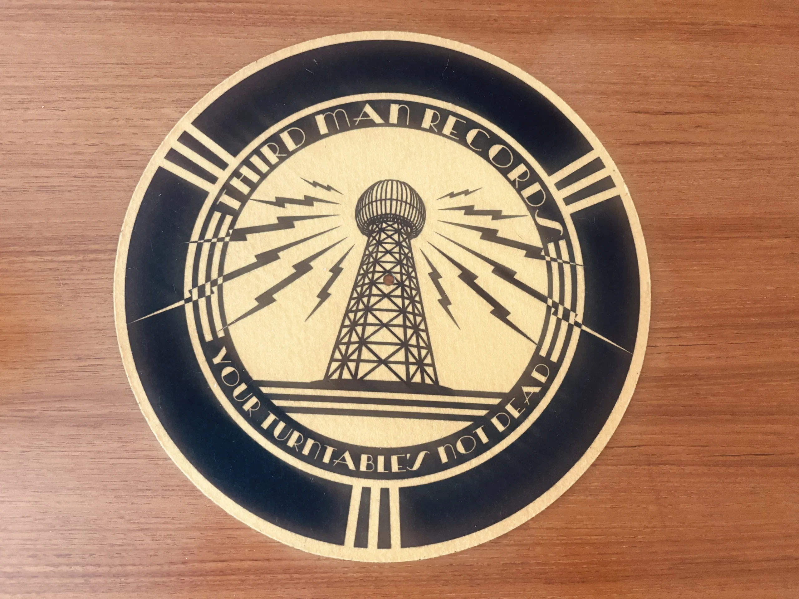 Slipmat on a vinyl turntable platter with record ready to play