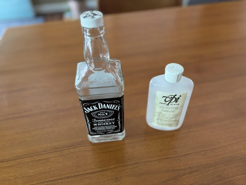 Homemade vinyl record cleaning solution based on London Jazz Collector recipe stored in a repurposed Jack Daniel’s bottle