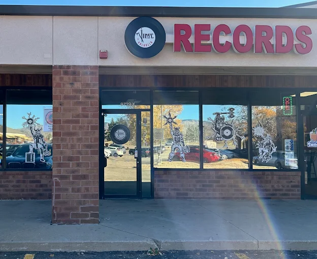 Vinyl Valhalla Records storefront in Littleton, Colorado, featuring a family-owned record store specializing in vinyl records, 45s, cassette tapes, reel-to-reel tapes, CDs, and music collectibles.