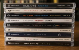 A stack of Super Audio CDs (SACDs) showcasing the high-resolution audio format popular with audiophiles and music collectors.